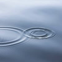 Kreise im Wasser - Metapher für die Weiterentwicklung des eigenen Coaching-Stils